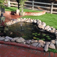 Artificial Turf Installation Combee Settlement, Florida Landscape Rock, Swimming Pools